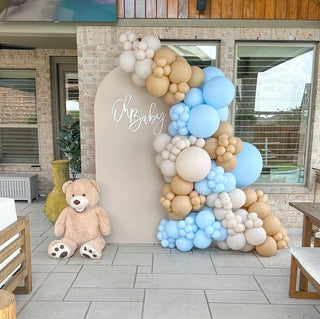 Baby shower set up nude tones and blue with one backdrop