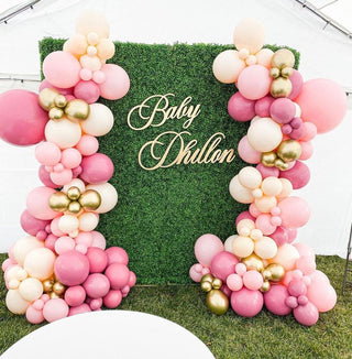 Baby shower girl themed with grass backdrop